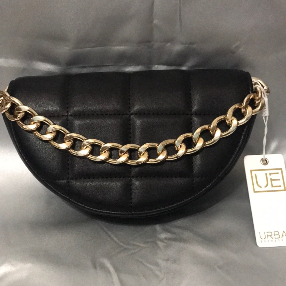 NWT Urban Expression Black Quilted Crossbody Bag a with a gold chunky chain.